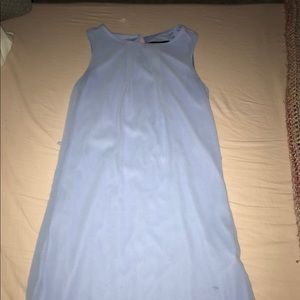 Blue dress w/ waist belt.